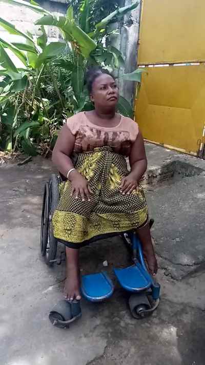 Mariette, 54 ans, une résidente de Toamasina en fauteuil roulant à Madagascar, mise à l'abri lors du passage du cyclone Batsirai les 5-6 février 2022