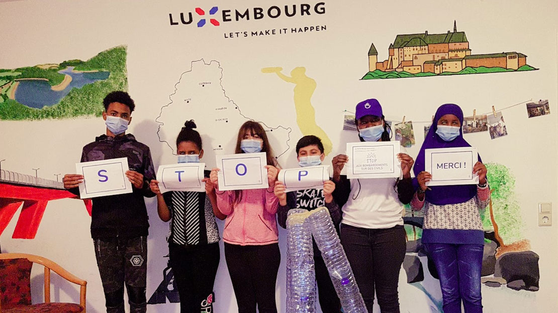 Nadège, bénévole chez HI LU, en session avec les jeunes